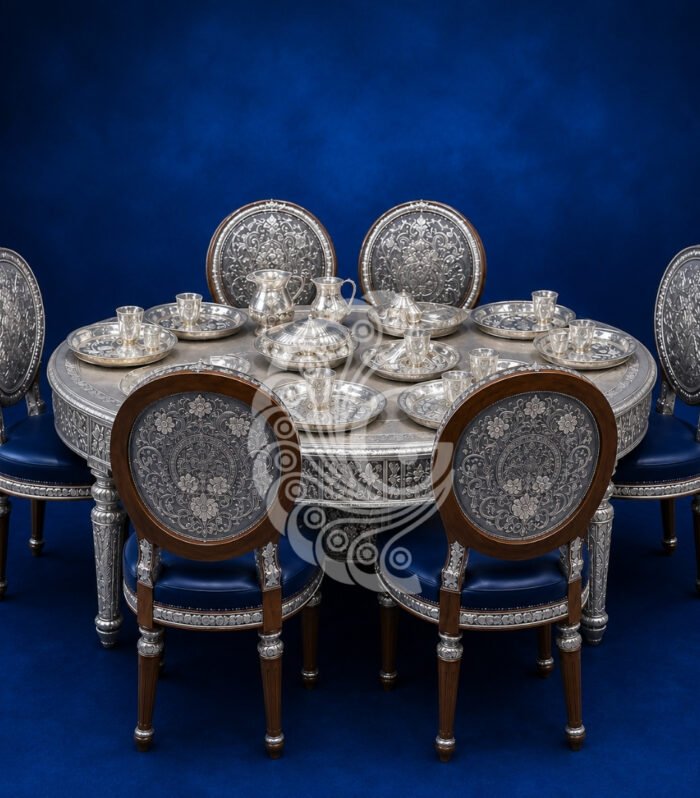 Luxury 999 silver sheeting round dining table and chairs with blue upholstery Gokulam Jewels