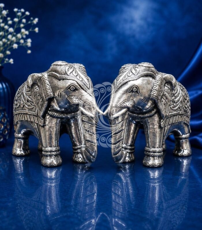 Handcrafted 999 silver sheeting elephant pair for luxury home decor Gokulam Signature Jewels