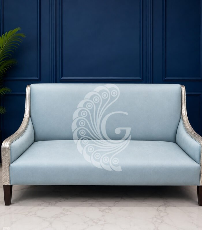 Luxury sky blue sofa with 999 silver sheeting nakshi work arms Gokulam Signature Jewels
