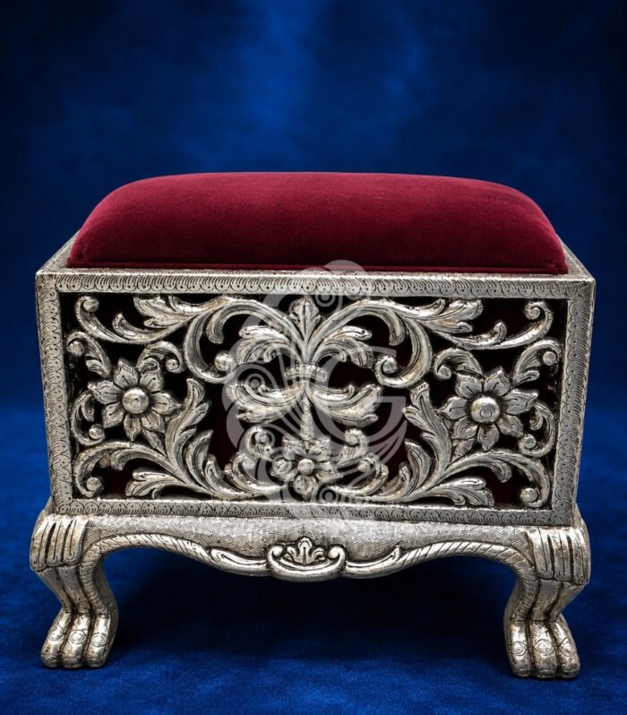 Handcrafted box-style 999 silver sheeting pooja stool with intricate jali work and maroon velvet