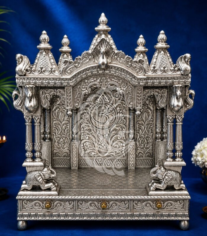 Large 999 silver sheeting pooja mandir with om symbol and elephant motifs Gokulam Signature Jewels