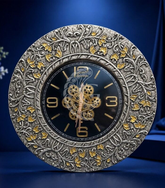 Luxury 999 silver sheeting circular table clock with gold leaf accents and mechanical dial Gokulam Jewels
