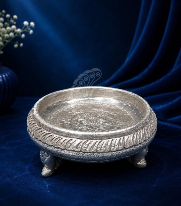 Handcrafted 999 silver sheeting petite floral urli with ornate stand Gokulam Jewels